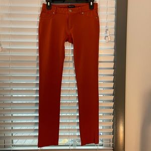 Shine star pants. Size large. Burnt orange color